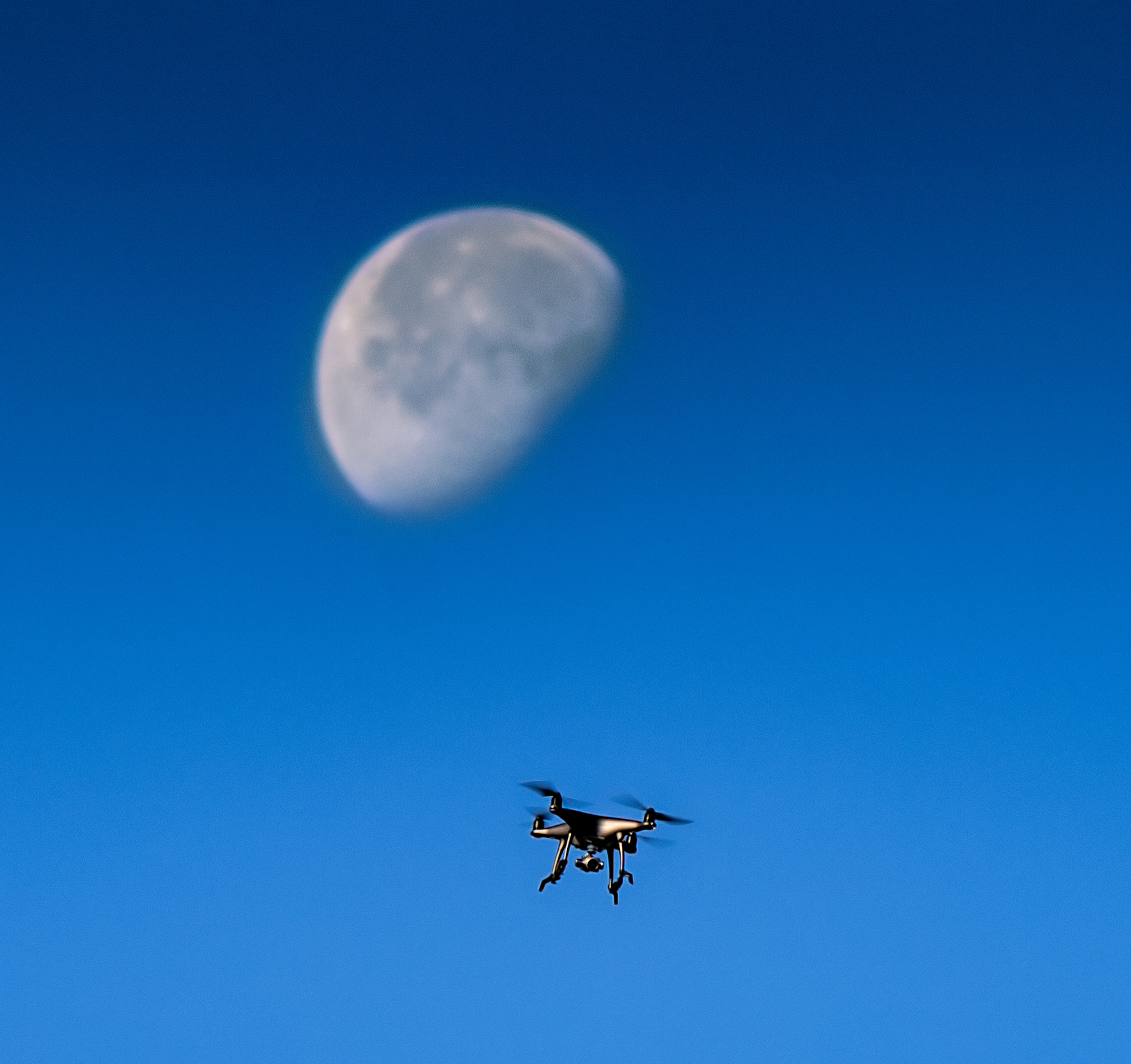 drone against the moon.jpg