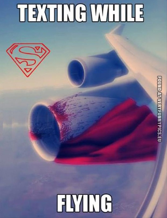 funny-picture-texting-while-flying-superman-in-airplane-engine.jpg