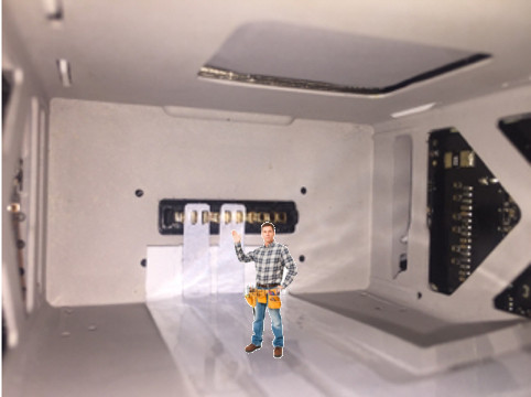 man in battery compartment.jpg