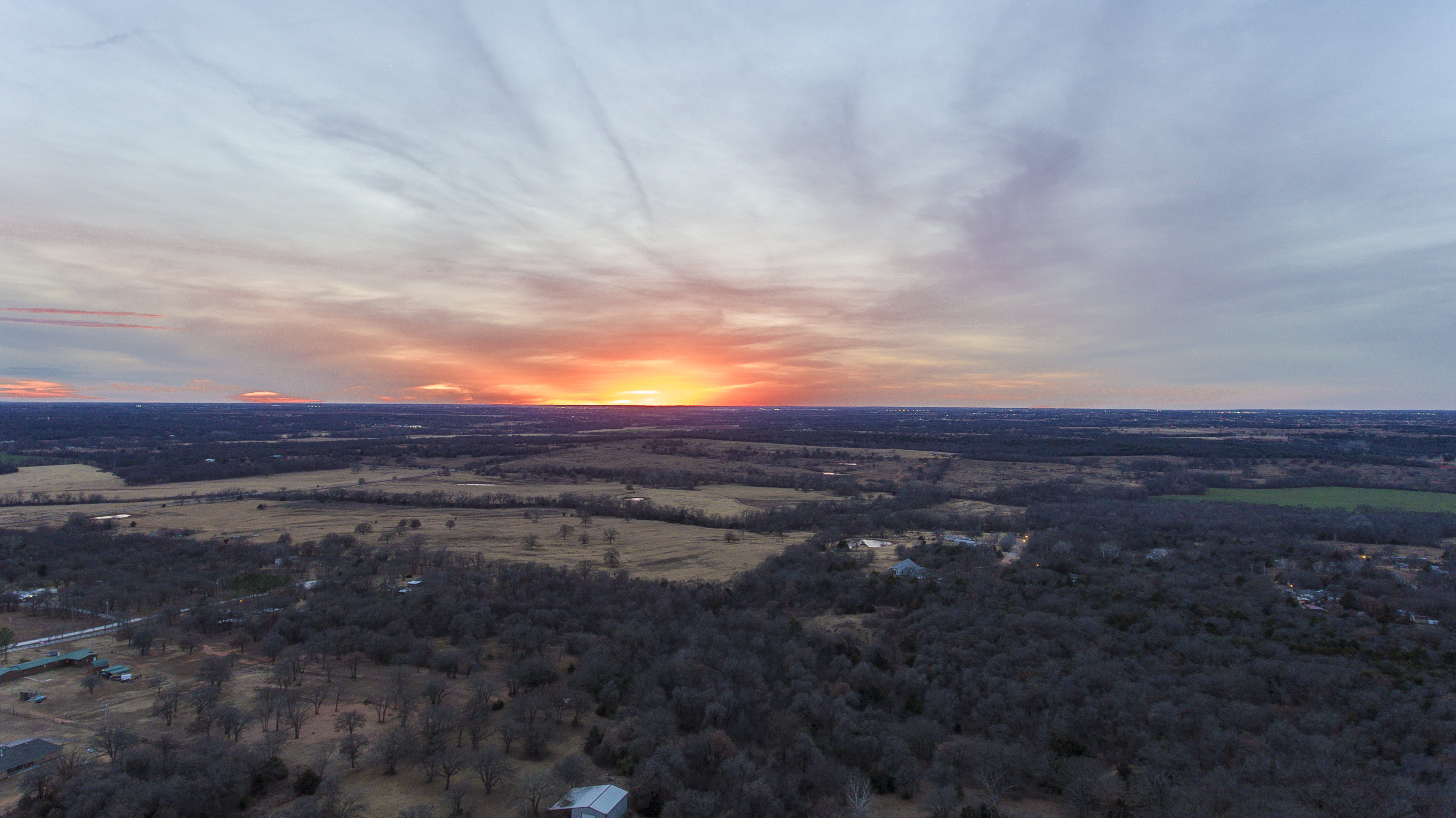 Sunset at 300 ft over the house.JPG