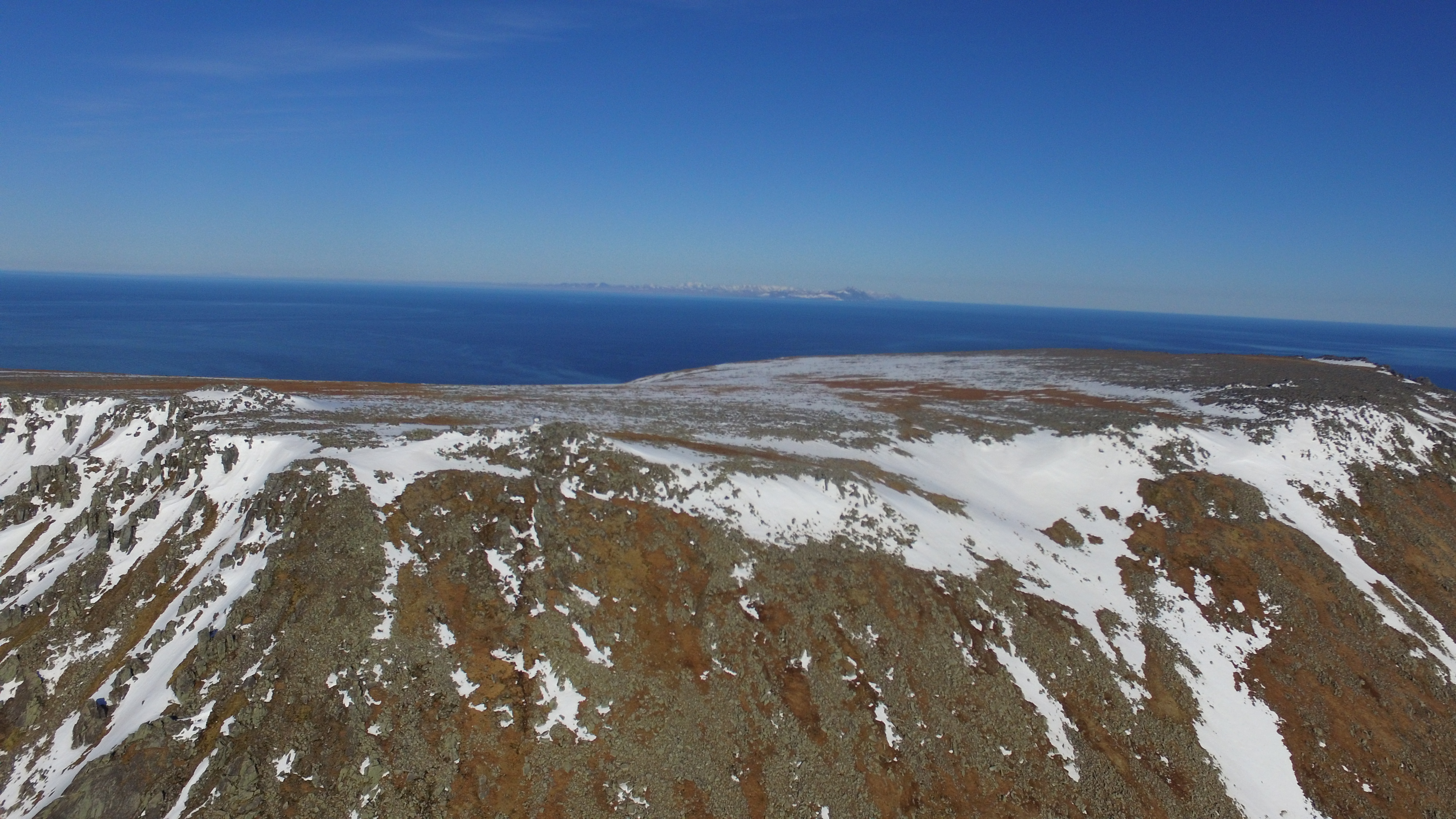 Diomede Island - over the top - US Mainland in the bacground